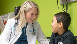 Dr. Michelle Hudspeth with a patient
